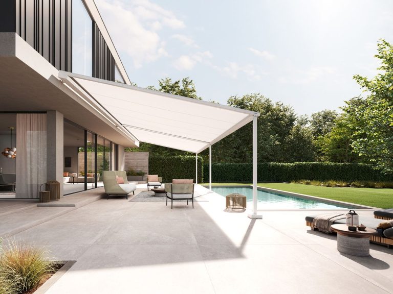 Markilux pergola style with a white fabric roof shading a poolside terrace
